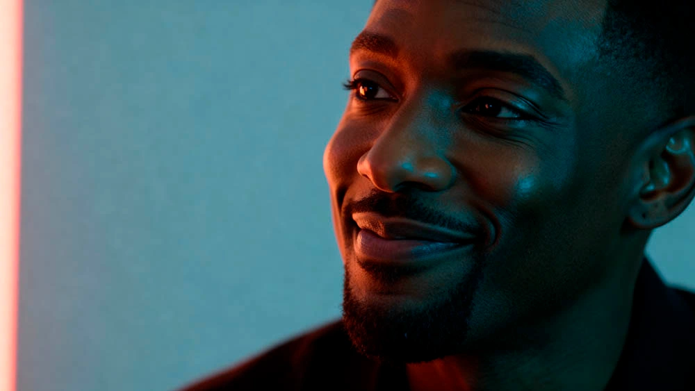 Magnetic Focus charismatic man listening focused neon cinematic atmosphere